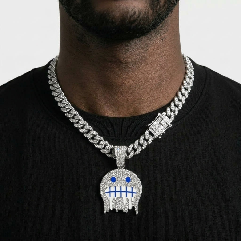 Iced Out Frozen Drip Emoji Pendant Necklace on Cuban Link Chain – Grimacing Face with Blue Enamel Eyes | Gold or Silver