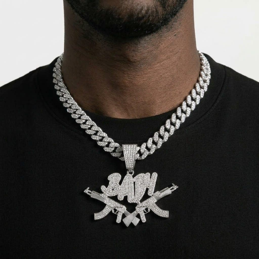 Iced Out Crossed Rifles Pendant Necklace on Cuban Link Chain – BABY Script Lettering | Gold or Silver