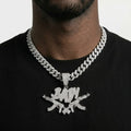 Iced Out Crossed Rifles Pendant Necklace on Cuban Link Chain – BABY Script Lettering | Gold or Silver