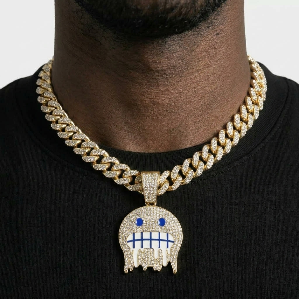 Iced Out Frozen Drip Emoji Pendant Necklace on Cuban Link Chain – Grimacing Face with Blue Enamel Eyes | Gold or Silver