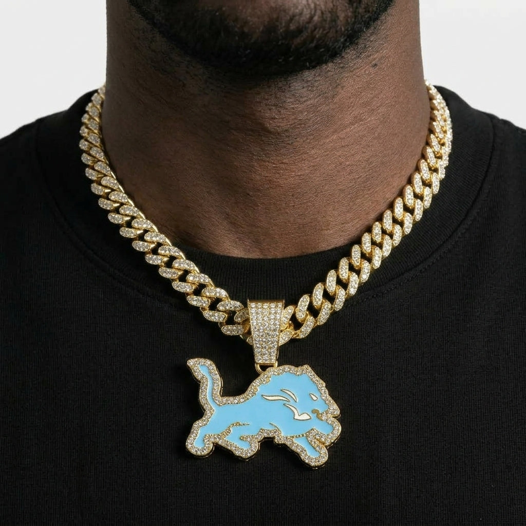 Detroit Lions Iced Out Pendant Necklace on Cuban Link Chain – Light Blue Enamel Leaping Lion with Stone-Set Border | Gold or Silver
