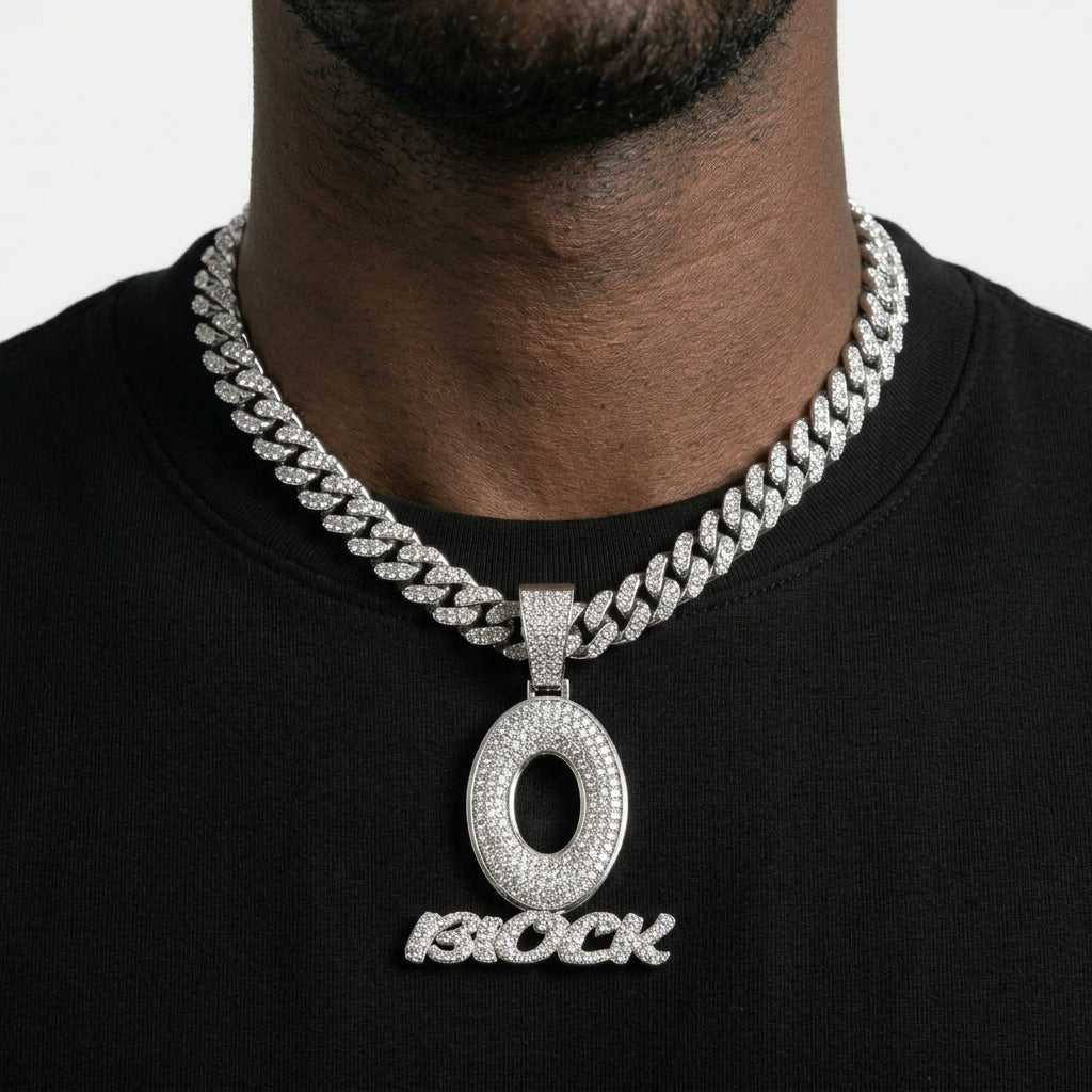 Iced Out O Block Pendant Necklace on Cuban Link Chain – Oversized Open O with Script Lettering | Silver or Gold