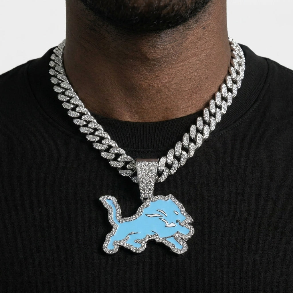 Detroit Lions Iced Out Pendant Necklace on Cuban Link Chain – Light Blue Enamel Leaping Lion with Stone-Set Border | Gold or Silver