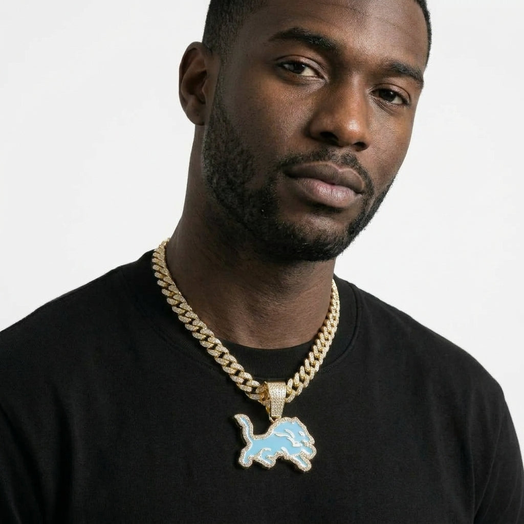 Detroit Lions Iced Out Pendant Necklace on Cuban Link Chain – Light Blue Enamel Leaping Lion with Stone-Set Border | Gold or Silver