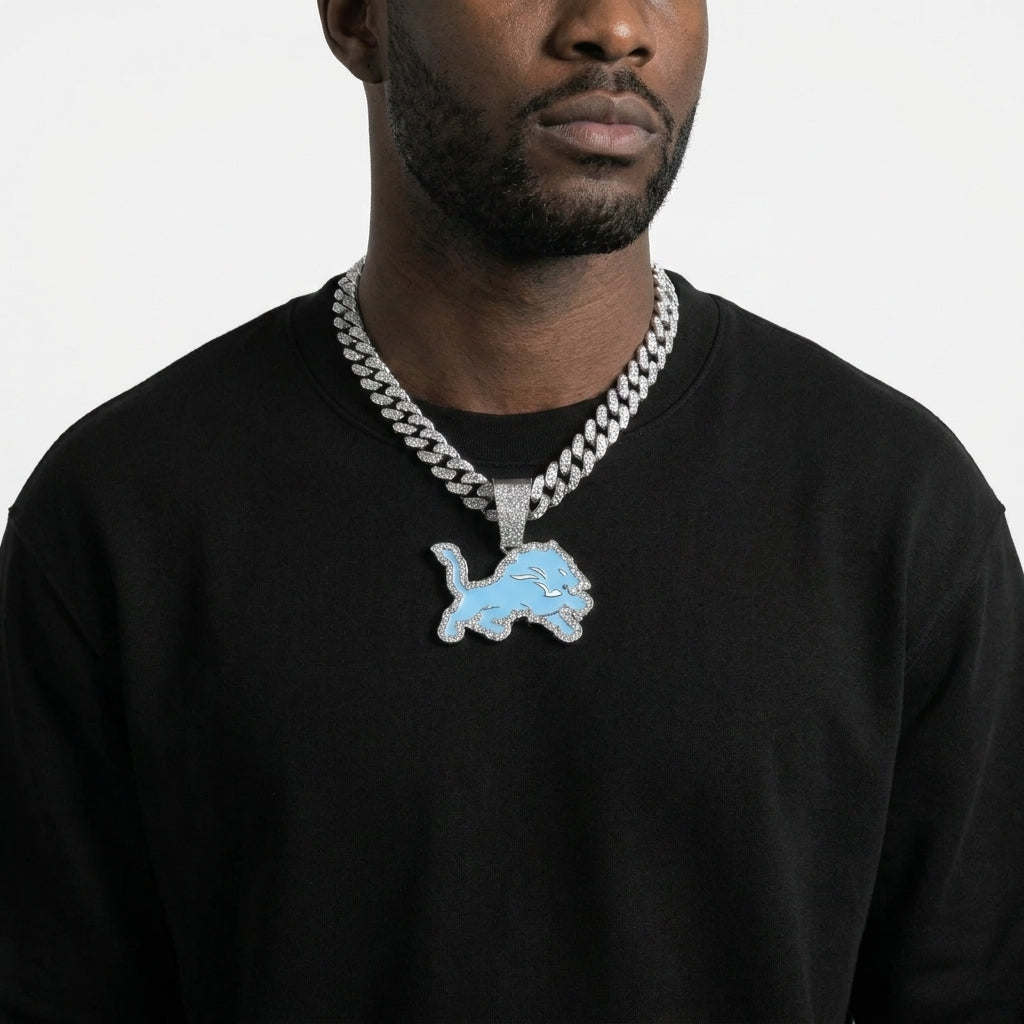 Detroit Lions Iced Out Pendant Necklace on Cuban Link Chain – Light Blue Enamel Leaping Lion with Stone-Set Border | Gold or Silver