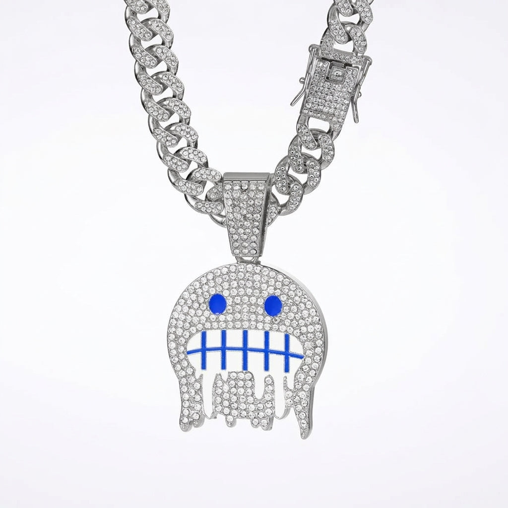 Iced Out Frozen Drip Emoji Pendant Necklace on Cuban Link Chain – Grimacing Face with Blue Enamel Eyes | Gold or Silver